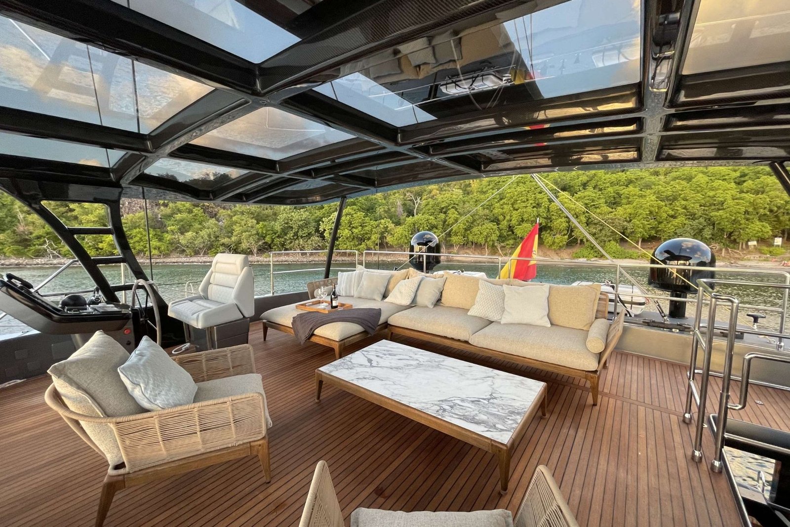 Sunreef 60 charter Ibiza catamaran flybridge lounge under the hardtop