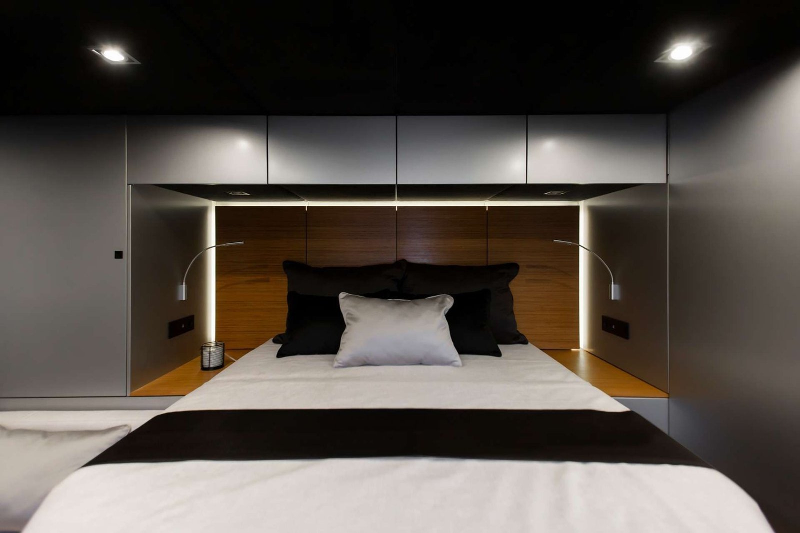 Sunreef 60 charter Ibiza catamaran master cabin with low lighting
