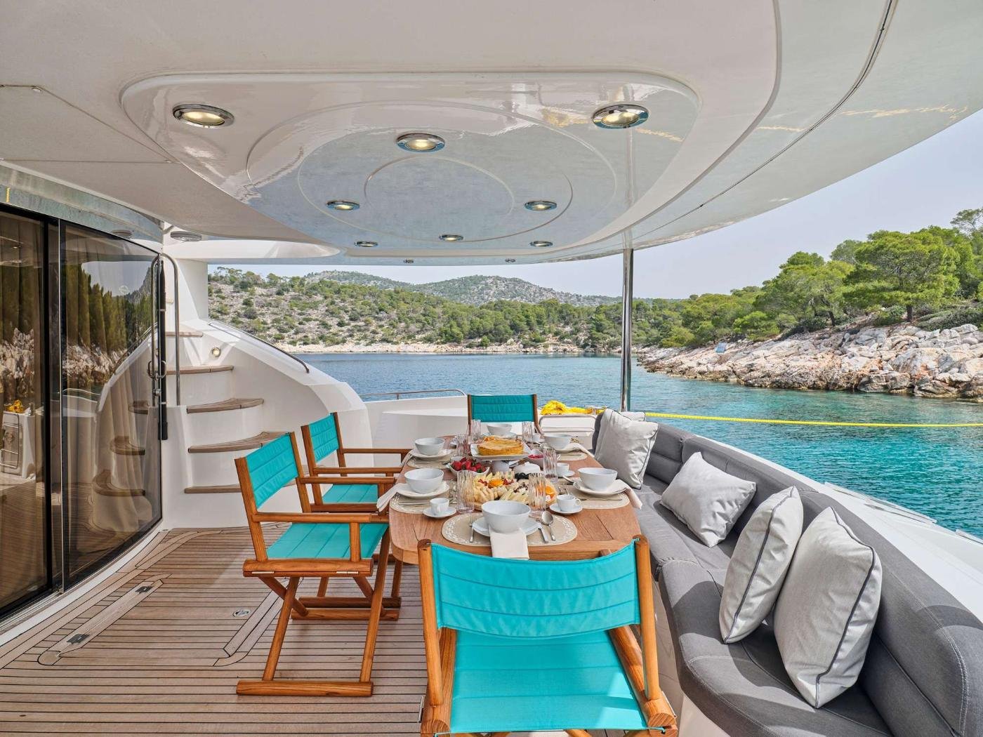Alfresco aft deck lunch setting on the Sunseeker 75 charter Athens motor yacht